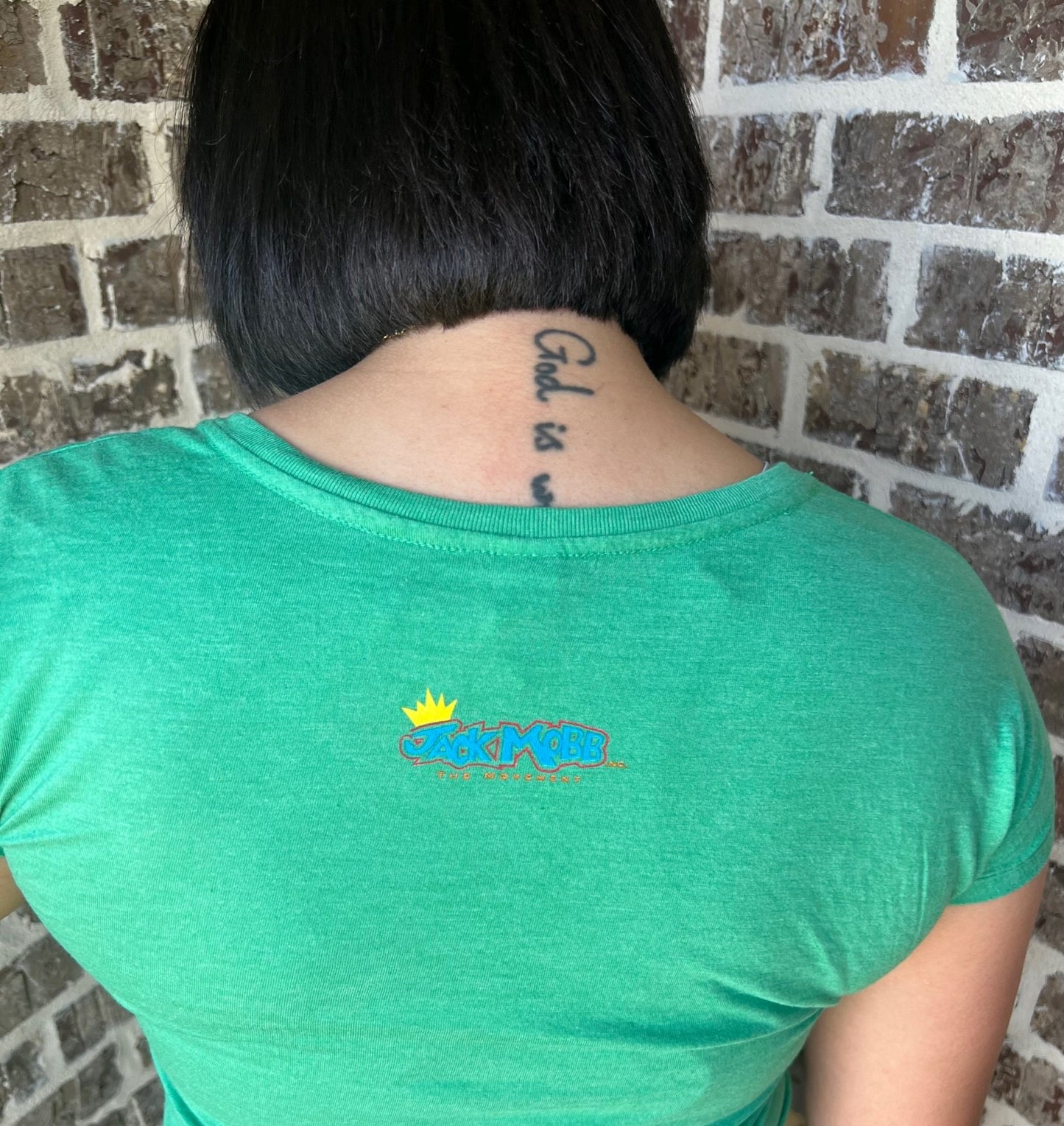 Women’s Classic JackMobb Graphic Green V-Neck Shirt